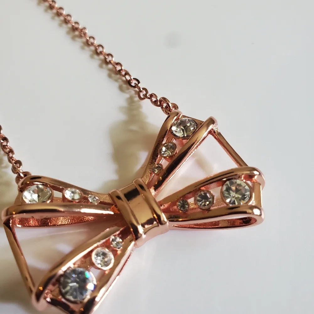 Ted Baker Gianni ROSE GOLD Joia Geometric Bow Pendant Necklace